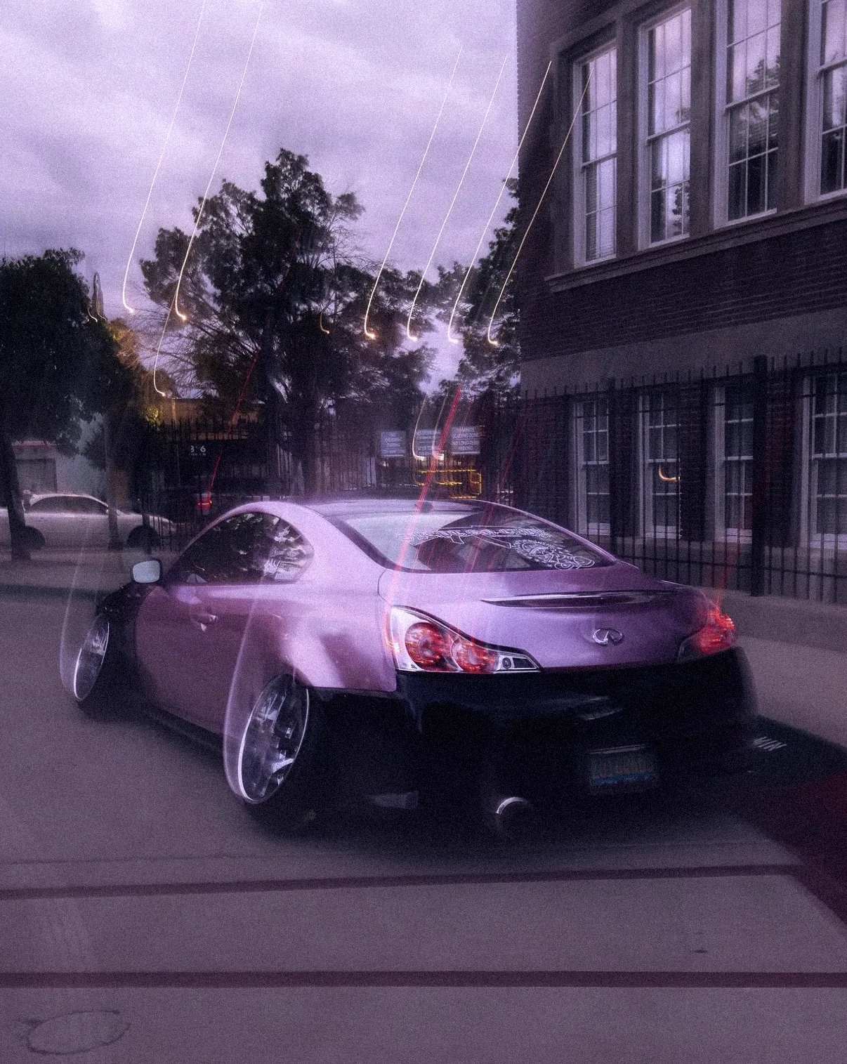 Pink Infiniti coupe in a dreamy double exposure